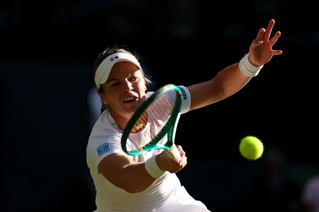 Caty Mcnally hits a forehand