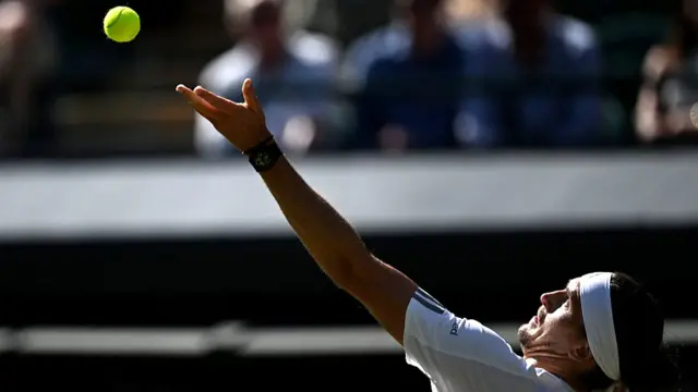 Alexander Zverev serves