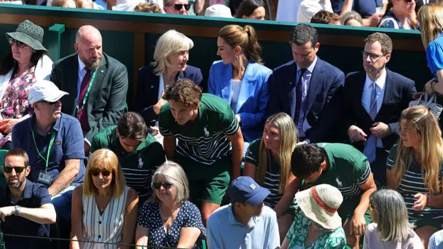 Kate Middleton sits in the crowd