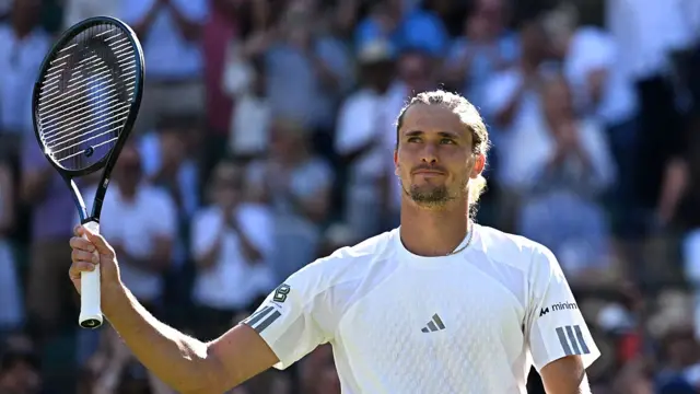 Alexander Zverev gestures to the crowd