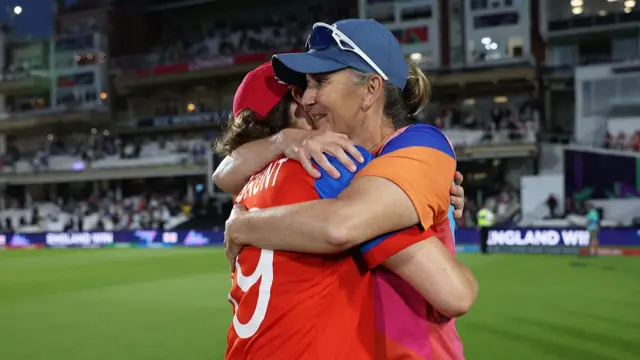 Nat Sciver-Brunt of England and Charlotte Edwards, Head Coach of England celebrate