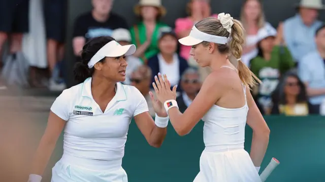 Heather Watson (GBR) and Katie Boulter (GBR) play doubles