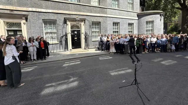 A large group of people on Downing Street