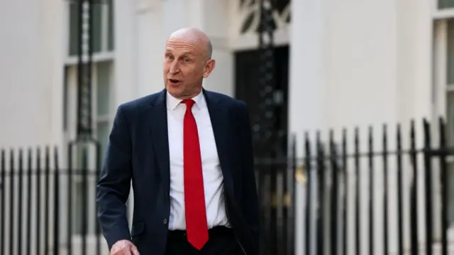 Britain's newly appointed Chancellor of the Exchequer, John Healey, walks on Downing Street after Britain's newly appointed Prime Minister Andy Burnham took office, in London, Britain, July 20, 2026.