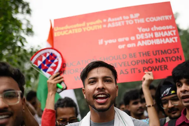 Activists and supporters of the Cockroach Janta Party (CJP) take part in a protest demanding the resignation of India's Education Minister Dharmendra Pradhan over alleged NEET examination irregularities in New Delhi on July 20, 2026. (Photo by Manan VATSYAYANA / AFP via Getty Images)