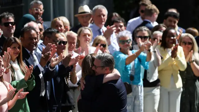 Starmer hugs wife