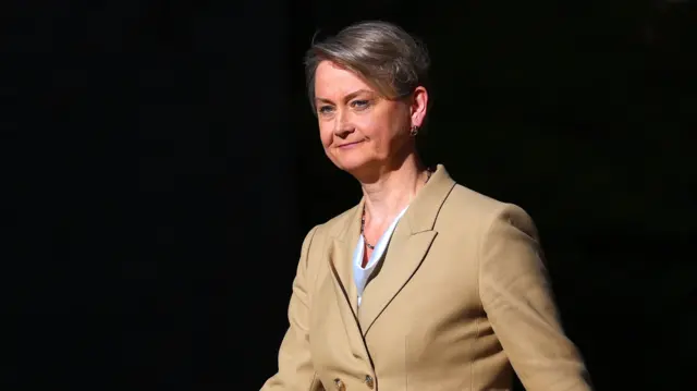 Yvette Coope walks up Downing Street