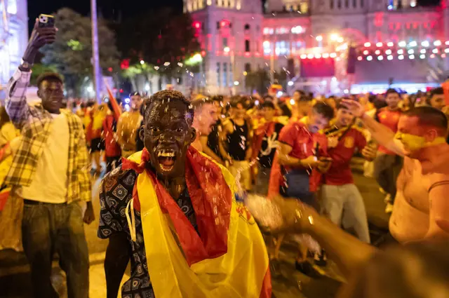 Spain fans celebrating in Madrid