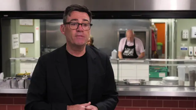 Andy Burnham speaks during an interview at a homeless shelter