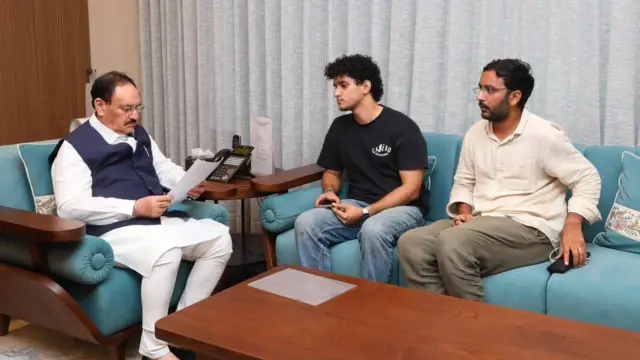 JP Nadda sitting with Saurav Das and Ashutosh Ranka