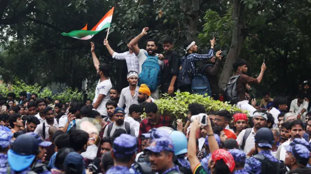 Supporters of the Cockroach Janta Party (CJP) gather for a protest march toward Parliament
