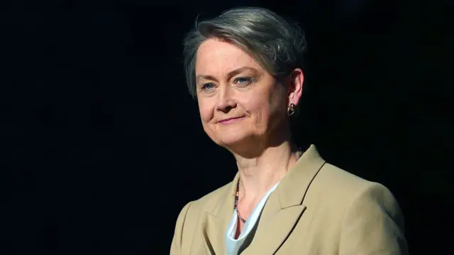 Yvette Cooper, wearing a brown blazer