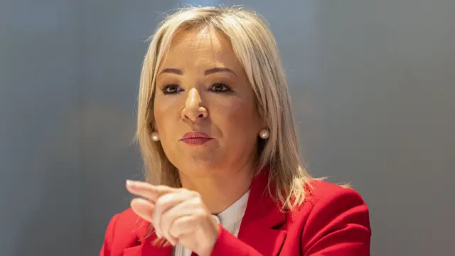 Northern Ireland First Minister Michelle O'Neill speaking and pointing her finger