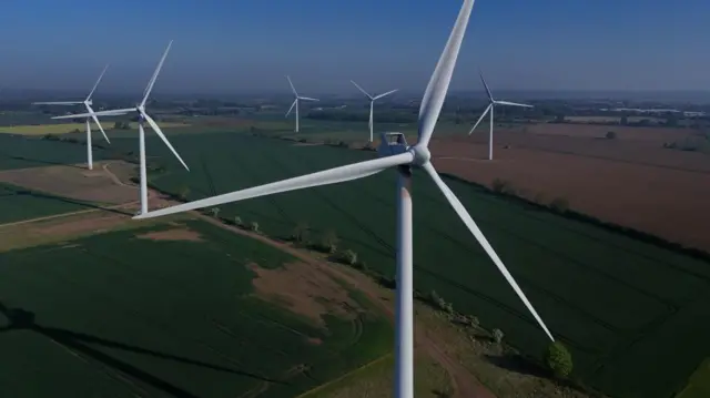 An image made with a drone shows an onshore wind farm in Biggleswade, Britain, 01 May 2025.
