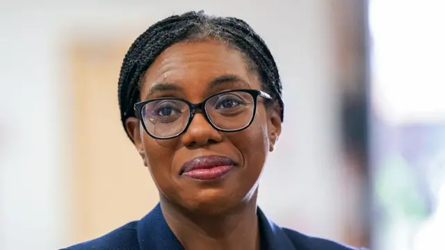 Kemi Badenoch wearing glasses