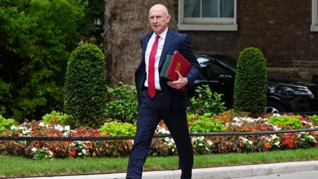 John Healey arriving on Downing Street