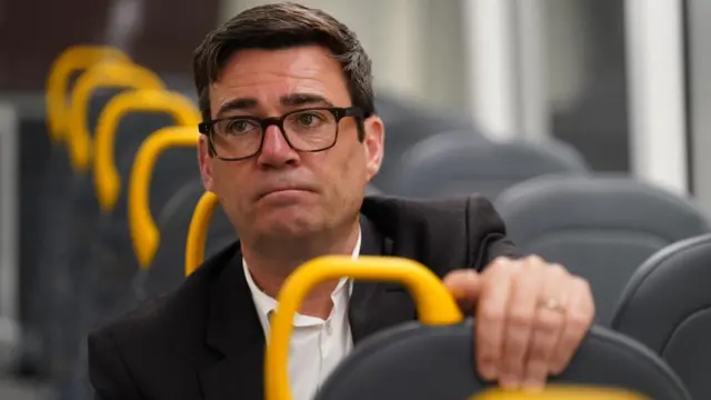 Burnham sat on the top deck of a bee network bus