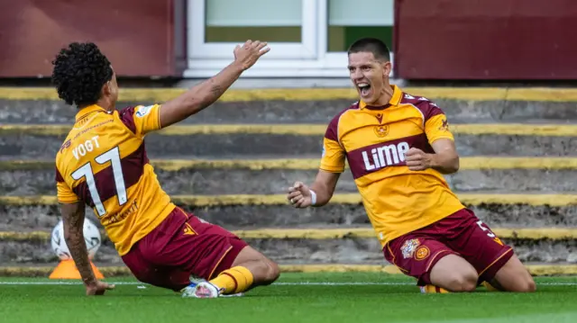 Motherwell goalscorer Martin Moormann (right) celebrates with Willy Vogt