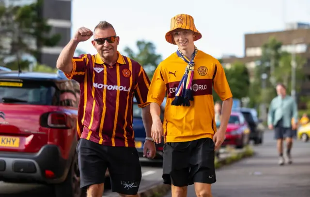 Motherwell fans on their way to the game