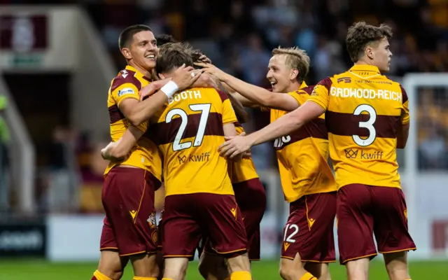 Motherwell players celebrate their second goal at Fir Park