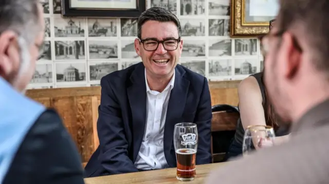 Britain's Prime Minister Andy Burnham visits the Hare Inn with Chancellor of the Exchequer John Healey, in Harlow, Essex, Britain, July 23, 2026
