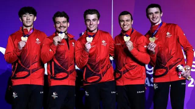 Canada with their team gold medals