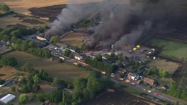 Smoke rises above the site of the incident