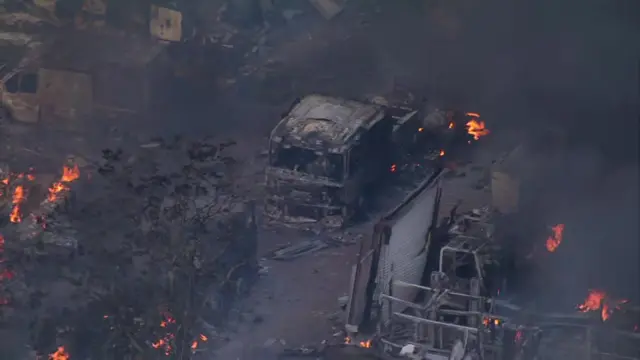 The burnt out cab of a lorry