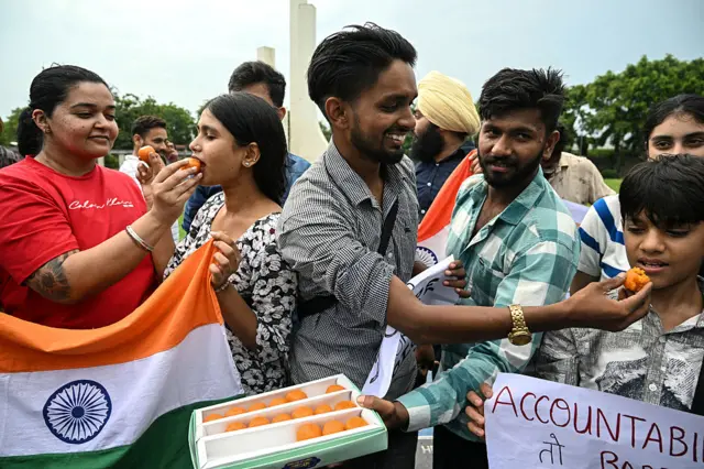 Students celebrate the resignation of India's Education Minister Dharmendra Pradhan, in Amritsar on July 25, 2026 amid an ongoing protest by the Cockroach Janta Party (CJP)