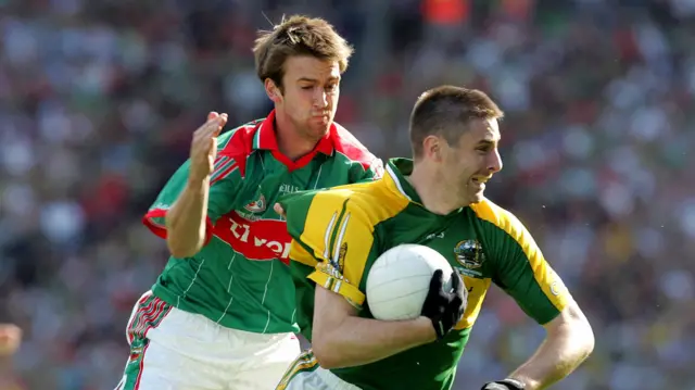 Mayo's Ronan McGarrity with Darragh O'Se of Kerry in the 2006 final