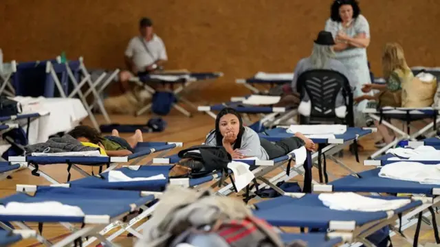 People affected by the wildfires take shelter at the Municipal Sports Hall of Villanueva de la Canada, Community of Madrid, Spain