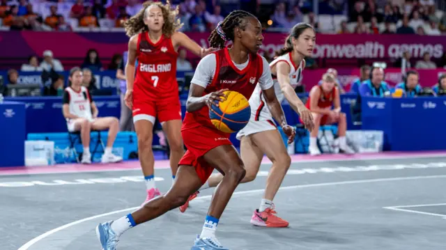 Shanice Beckford-Norton with the ball during England's game against Singapore at the Commonwealth Games in Glasgow