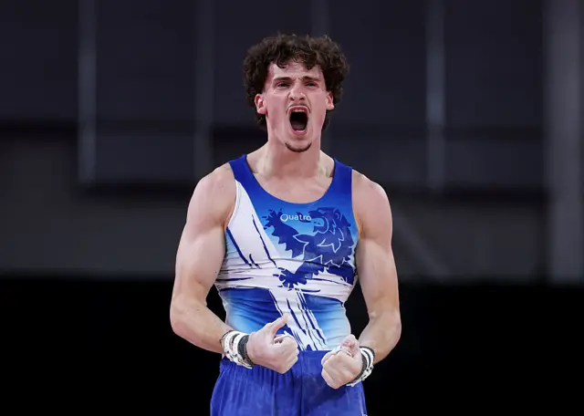 Reuben Ward of Team Scotland celebrates during the Men's All-Around Fina