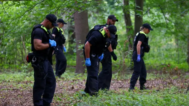 Police search the area after a deadly incident in which a vehicle crashed into a crowd near Berlin's annual Christopher Street Day Pride parade