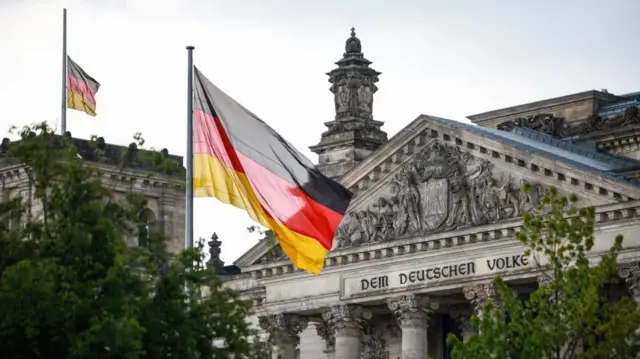 Flags flying half-mast at the Reichstag building