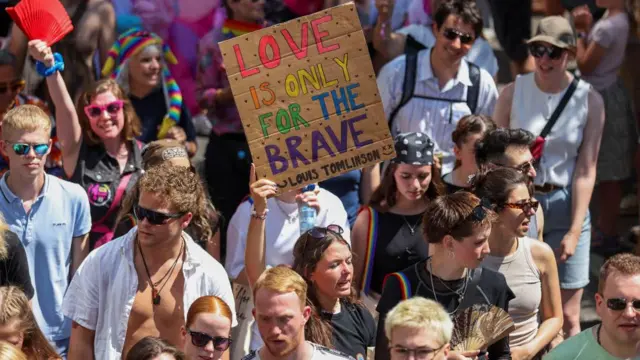 Revellers attend the annual Christopher Street Day Pride celebration