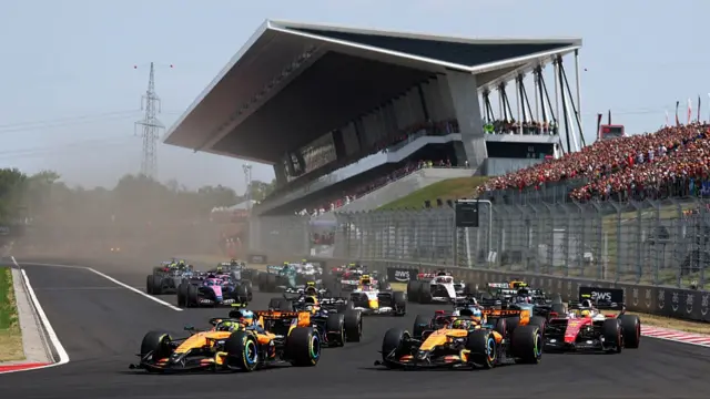 Lando Norris ahead in the first corner