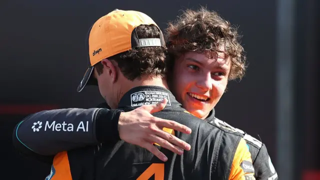 Kimi Antonelli hugs lando norris