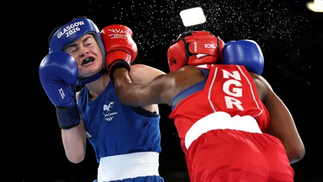 elen Jones of Team Wales and Kadijat Ajishola of Team Nigeria exchange punches