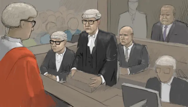 A court artist's sketch of Mr Justics Hilliard in a red robe and a white wig facing a male barrister also wearing a white wig and a black robe. Behind the barrister Robert Bush sits facing the judge wearing a dark suit with a purple tie