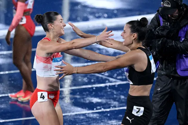Amy Hunt hugs Zoe Hobbs