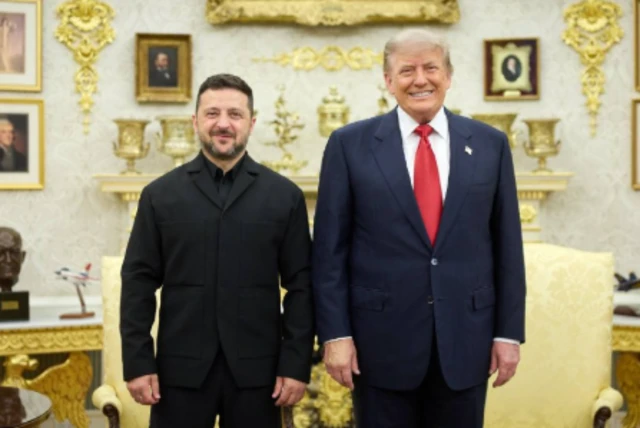 Zelensky and Trump pose for a photo in the Oval Office