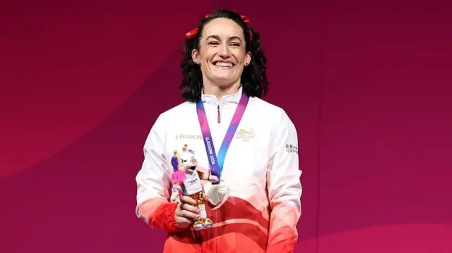 Sarah Davies Smale with her silver medal on the podium