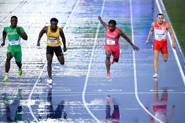 Jeremiah Azu and competitors in action