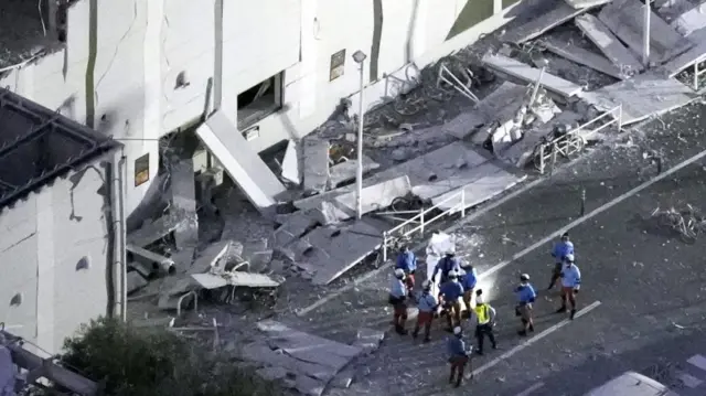 Rescue workers at the Aeon mall shopping centre