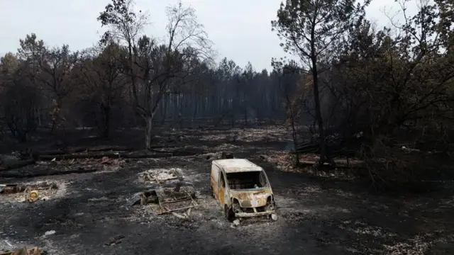 Buildings destroyed by fire in Le Porge, Gironde.