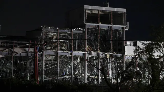 The shell of Aeon shopping centre pictured in the dark
