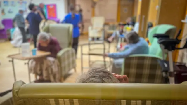 Elderly residents sit a communal area in a residential care home in Bridgwater, on October 12, 2024 in Bridgwater, England