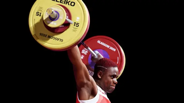 Madias Ngake lifting weights for England
