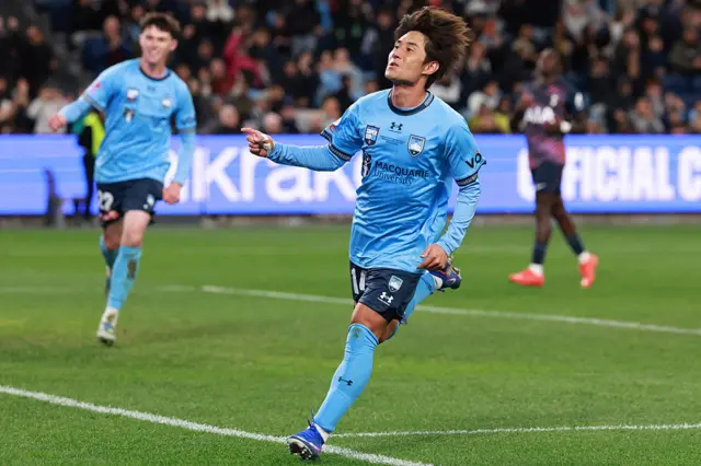 Sydney's Takahiro Sekine celebrates scoring a goal